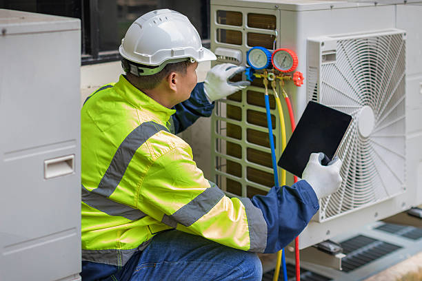 Professional Air Duct Cleaning technician working in Strasburg, VA